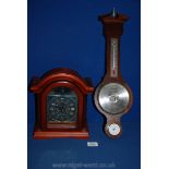A Bentima battery clock and a Comitti of London Barometer.