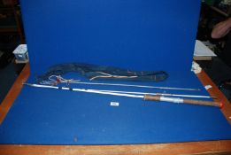 A Pegley Davies 6'9" fishing rod and stand in a sleeve.