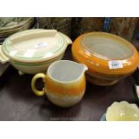 Three Art Deco pieces including a 1930's Shelley Harmony fruit bowl in orange and brown,