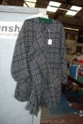 A two tone grey long Coat with button front and scarf made in Ireland.