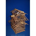 A bamboo bird cage, 50 cm high x 39 cm wide.