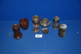 A quantity of Cornish serpentine lidded pots, vases, etc.