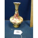 A Royal Worcester Vase having a scalloped rim in baluster form and painted with flowers,