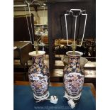 A pair of Oriental baluster Table Lamp bases in blue, orange and cream floral decoration,