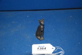 A small Egyptian revival bronze figure of a cat, probably 1920's. 6 cm tall.