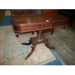 An elegant William IV period flap-over Tea Table standing on tapering turned pillar upon a platform