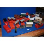 A quantity of 'O' gauge vintage model railway coaches, wagons, locomotives,