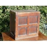 A desirable early Oak Spice Cupboard of peg joyned construction,