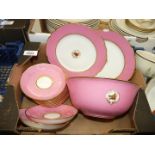 A quantity of Lerosey and Rihouet pink saucers and two plate together with a large bowl with family