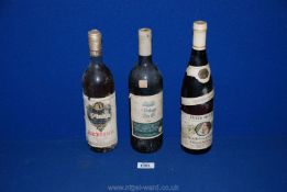 A bottle of Retsina from Greece, Liebfraumilch and a 1989 "Mukuyu, Bin 16" bottle of wine.