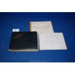 A Victorian Leather bound autograph album, dated 1897, full of poems, drawings, pressed flowers etc.
