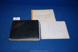 A Victorian Leather bound autograph album, dated 1897, full of poems, drawings, pressed flowers etc.