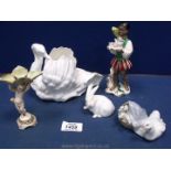 A quantity of figurines including; a Lladro figure of a mother duck and ducklings in a basket,