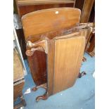A pair of high gloss finished Mahogany Single Bedsteads by Heals,