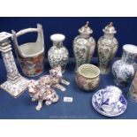 A quantity of oriental china including well bucket, candlestick, bowl, dogs, etc.