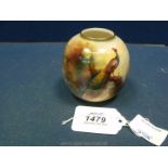 A Royal Worcester blush globe Pot having peacock decoration, date code for 1912, 2491,