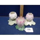 Three Royal Worcester lily shaped flower holders, date codes for 1903, 1905 and 1937,