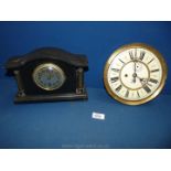 A small black marble Mantle Clock with brass cornithian columns, 7" high approx.