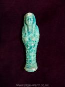 An ancient Egyptian Faience shabti, late period and most probably 26th dynasty,