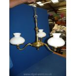 A brass tree branch Electrolier with oil lamp style shades.