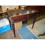 A dark Mahogany bow fronted Cutlery canteen Table standing on tapering square legs terminating in