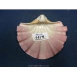 A Royal Worcester blush porcelain shell trinket dish in blush and pin, date code indistinct, G172,