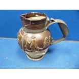 A small hunting Jug, damaged and repaired, the handle being replaced by metal framework. 7" tall.