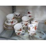 A quantity of Royal Worcester 'Evesham' tea and coffee ware: cups, saucers,