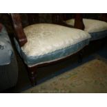 A pair of very appealing Edwardian bow back/tub Armchairs having turned front legs,