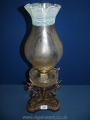 A metal based Oil Lamp with clear reservoir and pretty etched glass shade, 22'' tall,