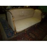 A large Louis XVI design three/four seater Sofa having exposed gilded wood and gesso frame