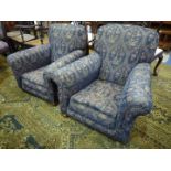 A pair of circa 1910 lady's and gent's fireside Chairs re-upholstered in navy blue and beige fabric