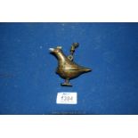 A small Indian hanging brass censer typically cast in the form of a parrot: some chiseled