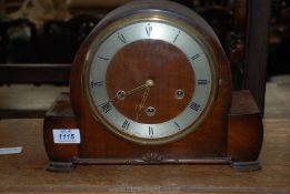 A Smiths domed Walnut type finished cased three train movement Mantel Clock,