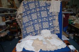 A quantity of Portuguese lace, table covers, serviettes,