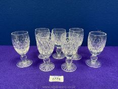 Seven cut glass sherry Glasses with matching cut glass pattern,