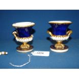 A pair of pretty miniature Crown Derby urn style Vases, with date mark for possibly 1782.