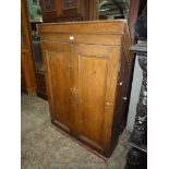 An antique combed woodgrain finished Pine wall hanging double doored Cupboard,