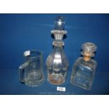 A glass decanter,