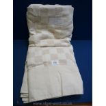 A cream cotton Ikea throw, 220 cm x 250 cm.