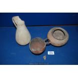 Three pre-Roman items of pottery: a bowl (probably Neolilthic),