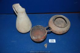 Three pre-Roman items of pottery: a bowl (probably Neolilthic),