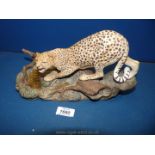 A Beswick Cheetah on a rock, approx. 6 3/4" tall.