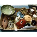 A quantity of pottery items including mugs, duck, piggy banks etc.