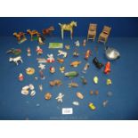 Miscellaneous wooden animals, two small dollhouse kitchen chairs, small blue Teddy,