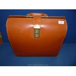 A leather briefcase, (Cheney, England), as new.