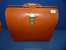 A leather briefcase, (Cheney, England), as new.