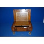 An inlaid Mahogany Writing Slope with inkwells and key,