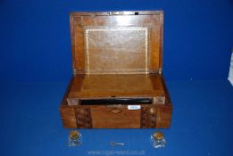 An inlaid Mahogany Writing Slope with inkwells and key,