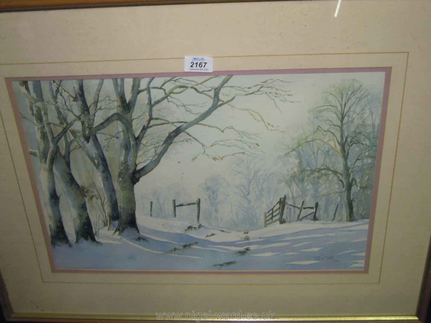 A large framed and mounted watercolour depicting a snowy country scene; signed Robert Price, - Image 2 of 2